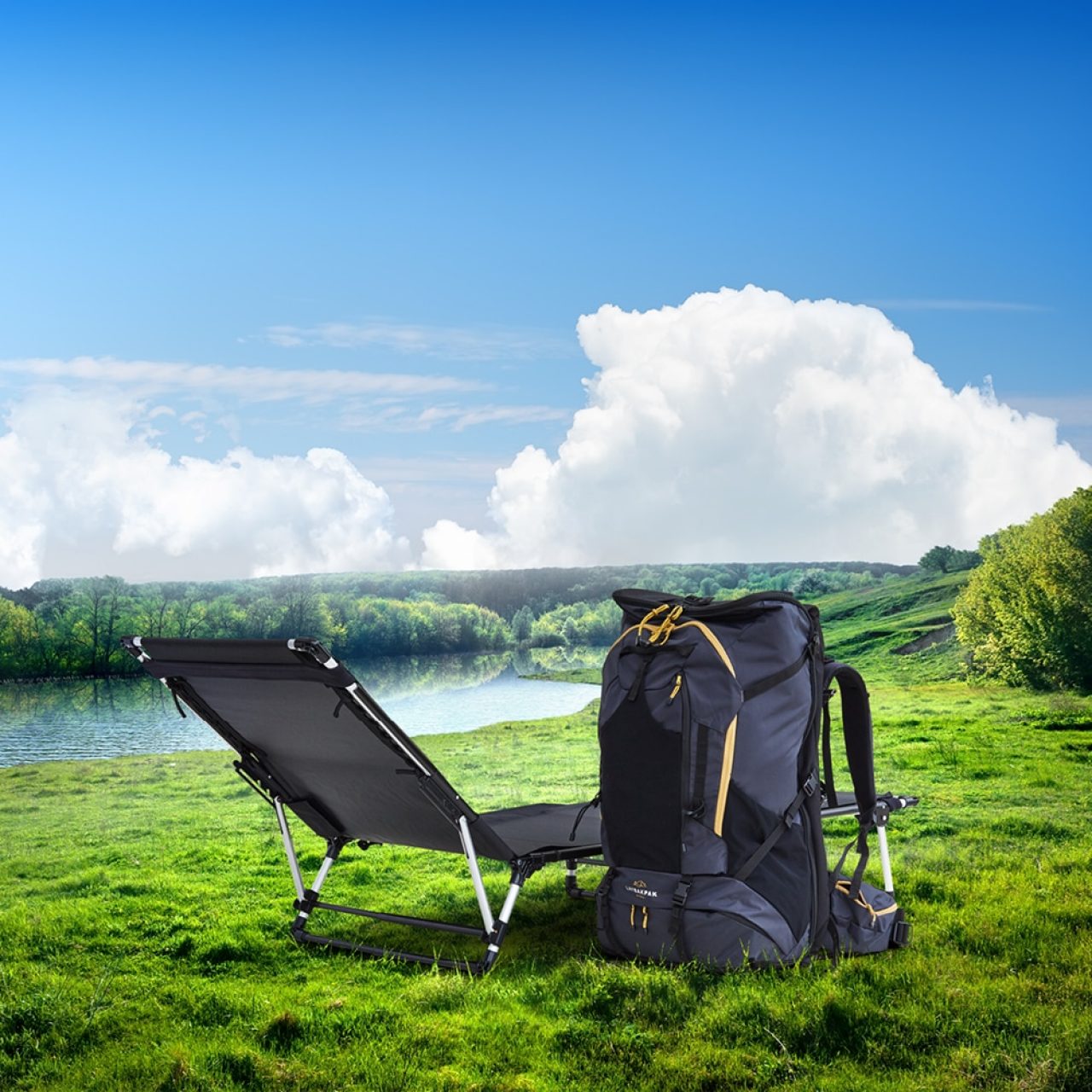 LayBakPak backpack with bed set up as a recliner beside a river