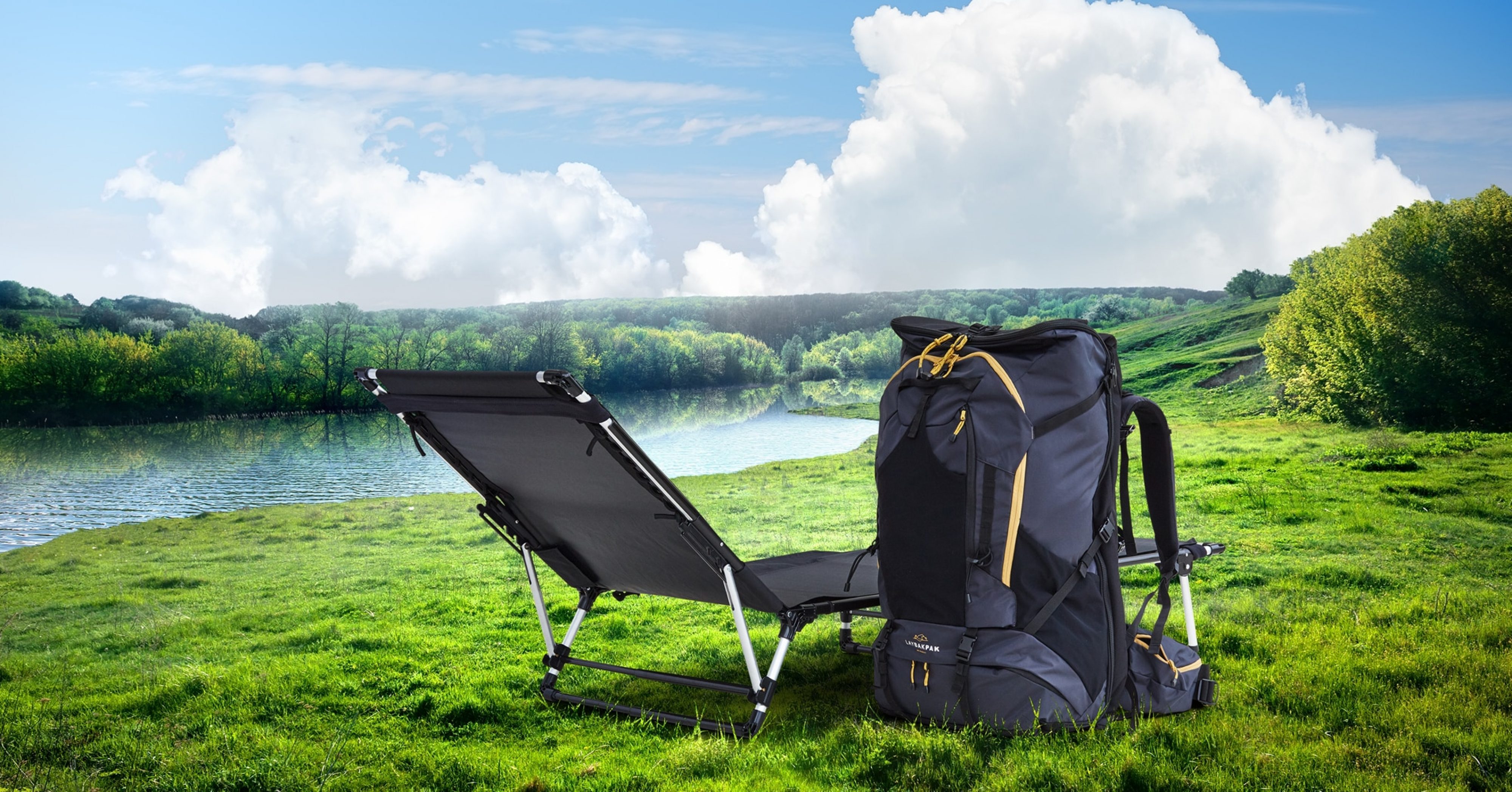 LayBakPak backpack with bed set up as a recliner beside a river
