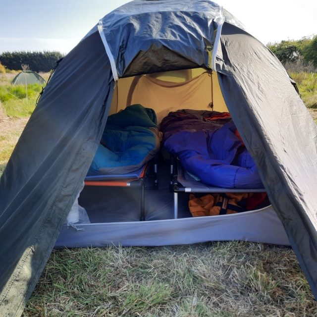 Two LayBakPak beds set up for sleeping in tent